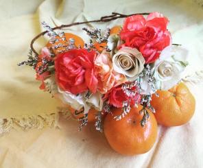 Tangerine crown made with spray roses, mini carnations and limonium (statice) | created by Natasha Price of Alaskaknitnat.com
