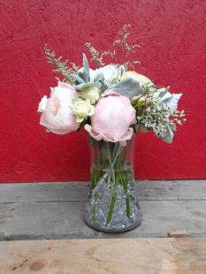 Wedding bouquet with peonies, garden roses, lisianthus, spray roses, limonium, salal and seeded eucalyptus | a romantic flower arrangement with a soft palate, designed by Natasha Price of Alaskaknitnat.com